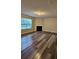 Inviting living room featuring a cozy fireplace, perfect for relaxing and entertaining guests at 2108 Cranberry Woods Ct, Charlotte, NC 28208