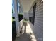 Porch with gray siding and white columns at 2108 Cranberry Woods Ct, Charlotte, NC 28208