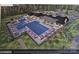 Aerial view of community pool with several lounge chairs, umbrellas, and a covered outdoor seating area at 218 Miramar Dr, York, SC 29745