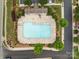 Bird's eye view of a community pool with lounge chairs and manicured landscaping at 2592 Brackley Nw Pl, Concord, NC 28027