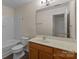 Cozy bathroom featuring a shower-tub combo and a single sink vanity at 2592 Brackley Nw Pl, Concord, NC 28027