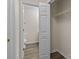 Walk-in closet that leads to the attached bathroom at 2592 Brackley Nw Pl, Concord, NC 28027