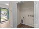Conveniently located laundry room off entry with lots of storage at 2592 Brackley Nw Pl, Concord, NC 28027