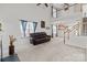 Spacious living room featuring vaulted ceilings, neutral carpet, a fireplace, and an open floor plan at 2592 Brackley Nw Pl, Concord, NC 28027