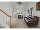 Bright living room with vaulted ceilings, neutral carpet, and a cozy fireplace at 2592 Brackley Nw Pl, Concord, NC 28027