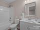 This bathroom is fitted with a shower over a tub, a vanity and tiled floors at 302 Flanders Dr, Mooresville, NC 28117