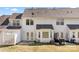 Exterior view of back of home featuring white siding, a fenced-in yard, and a patio area at 304 Valley Brook Se Ln, Concord, NC 28025