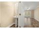 Bathroom featuring a pedestal sink with modern flooring and an open layout at 304 Valley Brook Se Ln, Concord, NC 28025