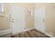 Entryway featuring two entry doors with modern flooring at 304 Valley Brook Se Ln, Concord, NC 28025