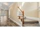 Hallway with stairway featuring carpet steps and modern flooring at 304 Valley Brook Se Ln, Concord, NC 28025