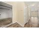 Hallway with access to garage, and a door leading to back patio at 304 Valley Brook Se Ln, Concord, NC 28025