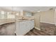 Kitchen with stainless steel sink and white cabinets at 304 Valley Brook Se Ln, Concord, NC 28025