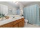 This bathroom offers a vanity with a shower/tub at 3101 Colvard Park Way, Charlotte, NC 28269