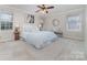 This bedroom offers a large window and a ceiling fan at 3101 Colvard Park Way, Charlotte, NC 28269