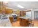 Functional kitchen with granite countertops, stainless steel appliances, and a central island with stools at 3101 Colvard Park Way, Charlotte, NC 28269