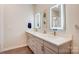 Elegant bathroom with double vanity, backlit mirrors, modern fixtures, and chic decor at 3630 N Davidson St, Charlotte, NC 28205