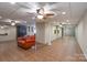 Finished basement area features ceramic tile and multiple ceiling fans at 368 Fairfield Ct, Mount Gilead, NC 27306