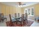 Charming dining room with wainscoting, rug and large windows at 368 Fairfield Ct, Mount Gilead, NC 27306