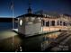 Charming night view of the private dock featuring ambient lighting and waterfront enjoyment at 368 Fairfield Ct, Mount Gilead, NC 27306