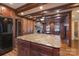 Spacious kitchen featuring wooden cabinets, a large island, and hardwood floors at 368 Fairfield Ct, Mount Gilead, NC 27306