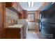 Well-equipped laundry room with modern washer and dryer, and convenient sink at 368 Fairfield Ct, Mount Gilead, NC 27306