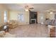 Bright living room with a decorative fireplace and large tile flooring at 368 Fairfield Ct, Mount Gilead, NC 27306