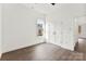 Spacious empty bedroom with hardwood floors and a closet at 4055 Miller Rd, Salisbury, NC 28147