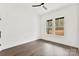 Bedroom featuring hardwood floors and a view of the wooded yard at 4055 Miller Rd, Salisbury, NC 28147