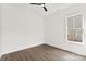 An empty bedroom featuring wood flooring and a ceiling fan at 4055 Miller Rd, Salisbury, NC 28147