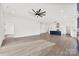 Large living room with hardwood floors that leads into the modern kitchen at 4055 Miller Rd, Salisbury, NC 28147