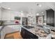 Spacious kitchen featuring stainless appliances, central island, and adjacent dining area at 420 Medearis Dr, Charlotte, NC 28211