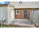 Small fenced backyard featuring both brick and vinyl siding at 430 Stoneycreek Ln, Rock Hill, SC 29730