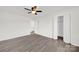 Bedroom featuring luxury vinyl plank flooring, ceiling fan, and closet at 430 Stoneycreek Ln, Rock Hill, SC 29730