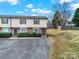 The exterior of the townhome features brick and vinyl siding at 430 Stoneycreek Ln, Rock Hill, SC 29730