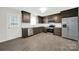 Renovated kitchen with stainless steel appliances and white tiled backsplash at 430 Stoneycreek Ln, Rock Hill, SC 29730