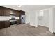 Kitchen with stainless steel appliances adjacent to laundry room at 430 Stoneycreek Ln, Rock Hill, SC 29730