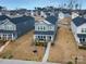 An aerial view of a charming two-story home in a neatly arranged neighborhood at 514 Nixon Rd, Belmont, NC 28012