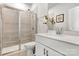 Bright bathroom with a walk-in shower, modern sink, and vanity offers a stylish and functional space at 514 Nixon Rd, Belmont, NC 28012