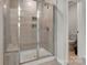 Walk-in shower with glass door showcasing modern design and functionality for a luxurious bathing experience at 514 Nixon Rd, Belmont, NC 28012