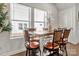 Bright breakfast nook with modern table and leather chairs, illuminated by natural light at 514 Nixon Rd, Belmont, NC 28012