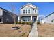 Charming two-story home with a well-manicured lawn and inviting front porch at 514 Nixon Rd, Belmont, NC 28012