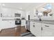 Kitchen with white cabinets, stainless steel appliances, and gray countertops at 703 E Mills Dr, Landis, NC 28088