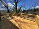 A newly constructed wooden deck provides a relaxing outdoor space at 705 Clara St, Gastonia, NC 28054