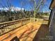 A newly constructed wooden deck provides a relaxing outdoor space at 705 Clara St, Gastonia, NC 28054