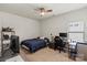 Bedroom with bright natural light, a ceiling fan, a work space, and carpet for a quiet place to rest at 7200 Irongate Dr, Lancaster, SC 29720