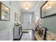 Bright and inviting foyer featuring a neutral color scheme, decorative accents, and a glimpse of the front door at 7200 Irongate Dr, Lancaster, SC 29720
