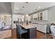 Gourmet kitchen with a large island, pendant lighting, granite counters, and ample cabinet space for storage at 7200 Irongate Dr, Lancaster, SC 29720
