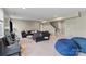 Cozy living room featuring comfortable seating, neutral walls, and carpet flooring, perfect for relaxation and entertainment at 7200 Irongate Dr, Lancaster, SC 29720
