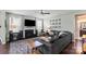Inviting living room featuring a fireplace, large sofa, and neutral decor creating a relaxing atmosphere at 7200 Irongate Dr, Lancaster, SC 29720