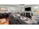 Cozy living room with a fireplace, comfortable seating, and an open layout connecting to the kitchen at 7200 Irongate Dr, Lancaster, SC 29720